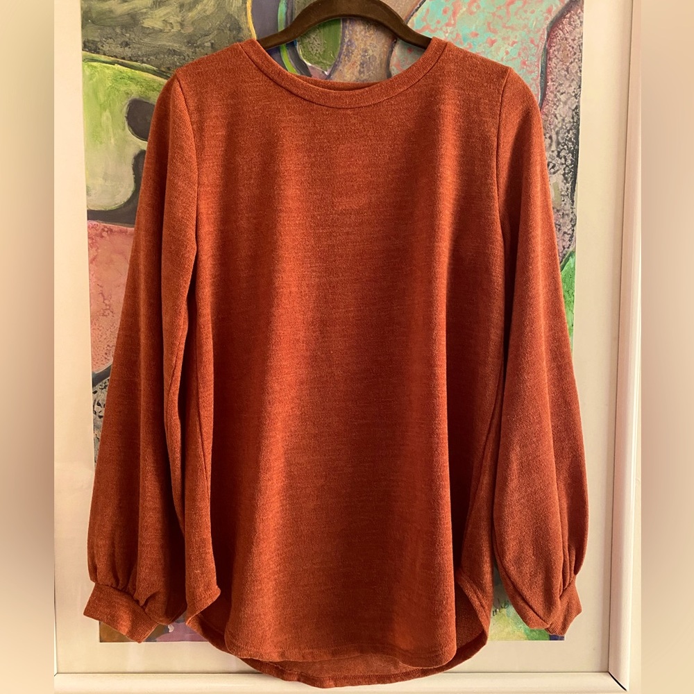 Bell sleeved top